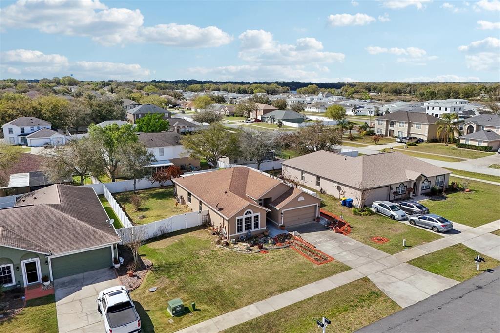2315 Belfry Way Mascotte, FL 34753 - Photo 48 of 55 an aerial view of a house with a swimming pool