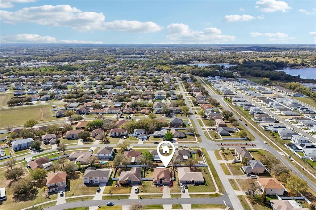 2315 Belfry Way Mascotte, FL 34753 - Photo 50 of 55 an aerial view of a city