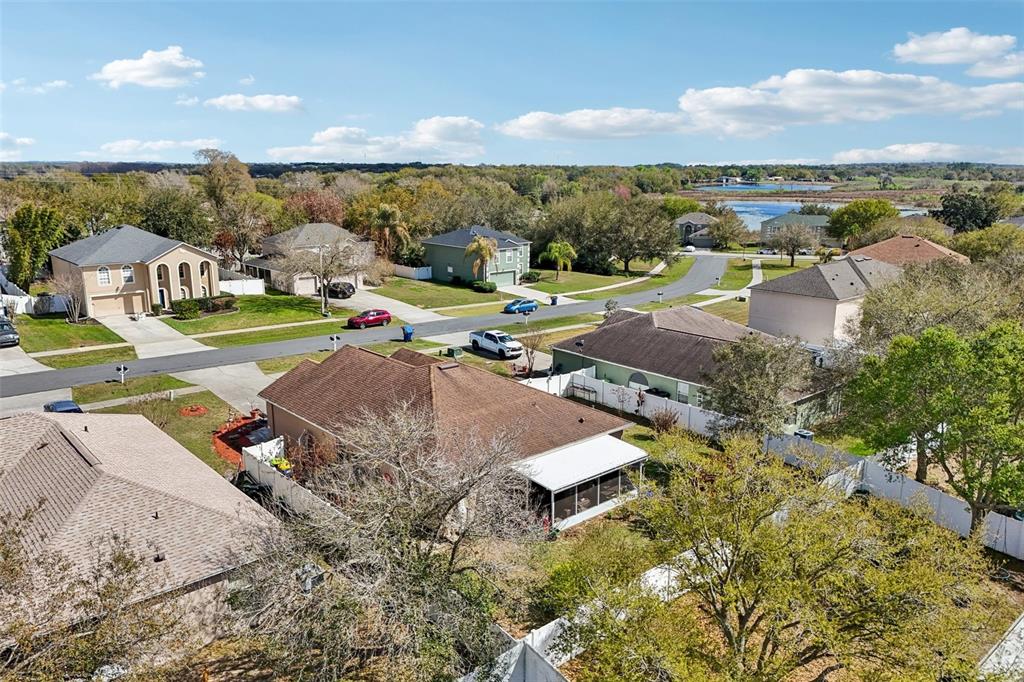 2315 Belfry Way Mascotte, FL 34753 - Photo 53 of 55 an aerial view of residential houses with outdoor space