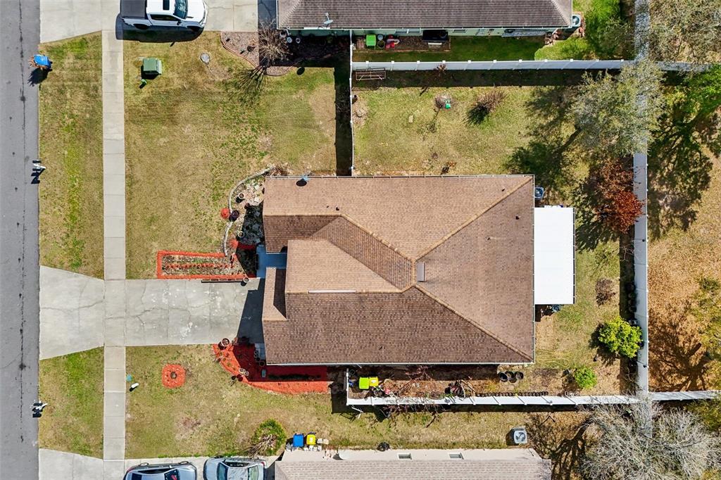 2315 Belfry Way Mascotte, FL 34753 - Photo 54 of 55 aerial view of a house with a swimming pool