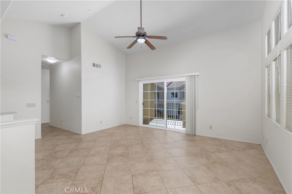 93 Kansas Street, Unit 202 Redlands, CA 92373 - Photo 12 of 40 a view of an empty room with a window