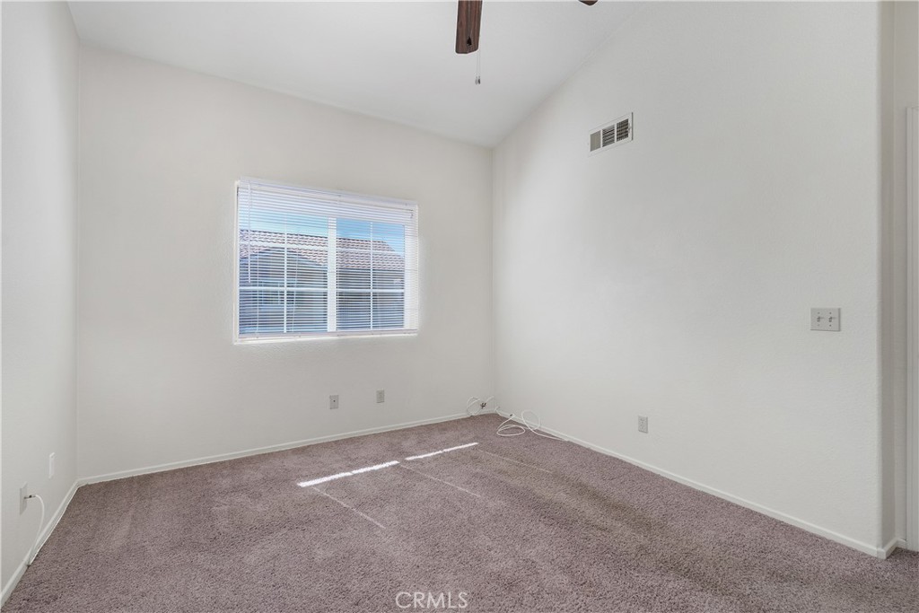 93 Kansas Street, Unit 202 Redlands, CA 92373 - Photo 25 of 40 an empty room with windows