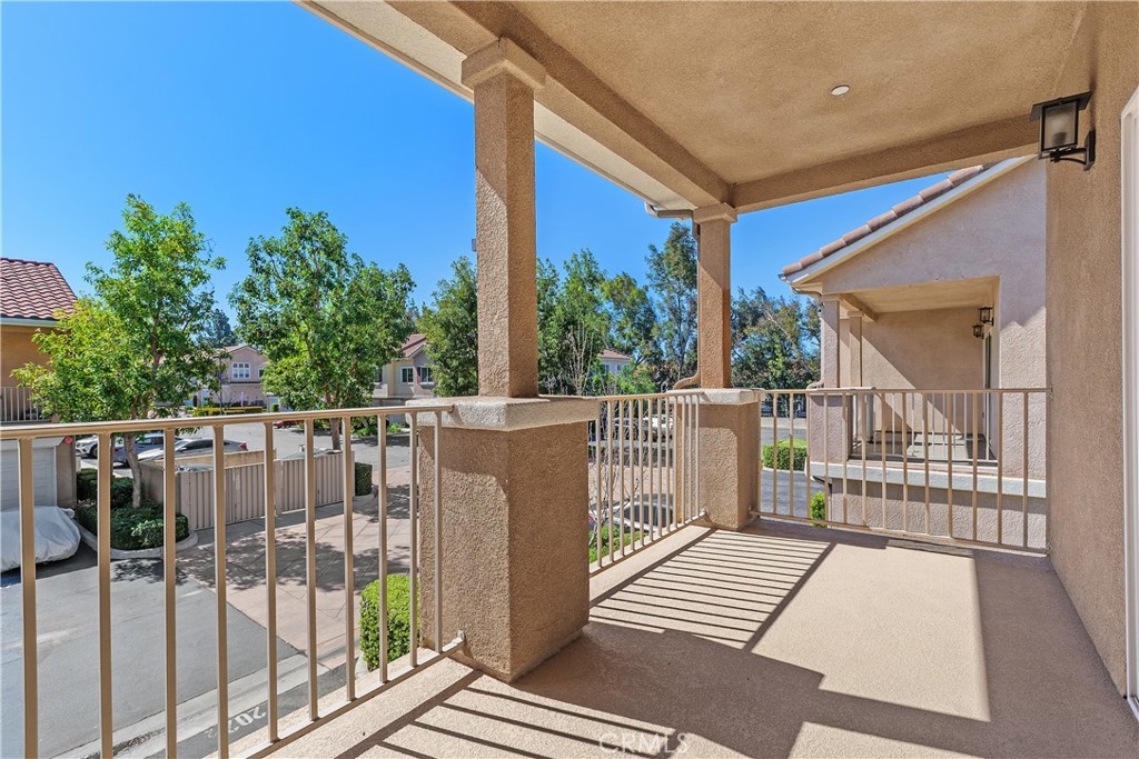 93 Kansas Street, Unit 202 Redlands, CA 92373 - Photo 31 of 40 a view of a balcony with wooden floor