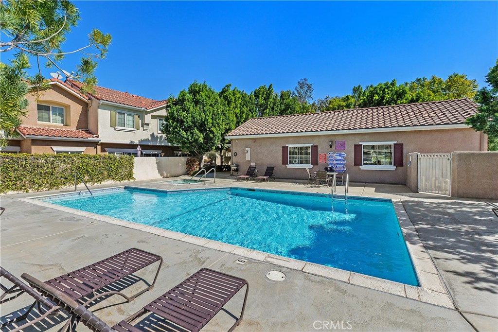 93 Kansas Street, Unit 202 Redlands, CA 92373 - Photo 35 of 40 front view of a house with a yard