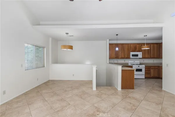a view of a kitchen with a sink