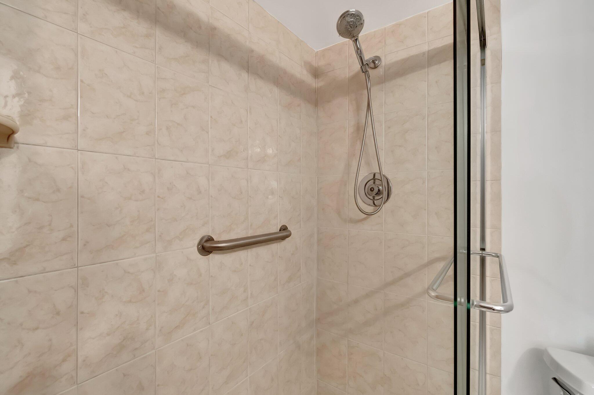 4049 Wolverton C Boca Raton, FL 33434 - Photo 27 of 88 a bathroom with a shower