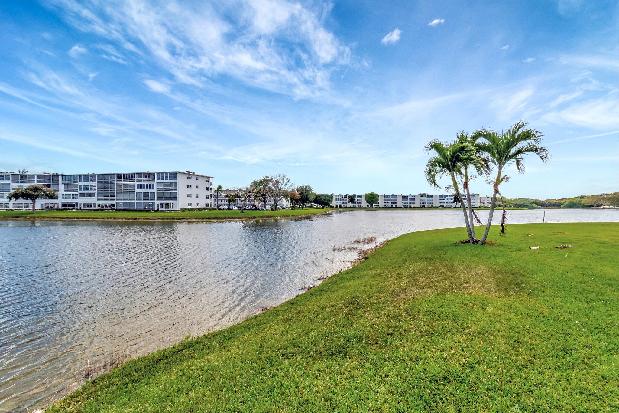 4049 Wolverton C Boca Raton, FL 33434 - Photo 43 of 88 a view of a lake with a big yard