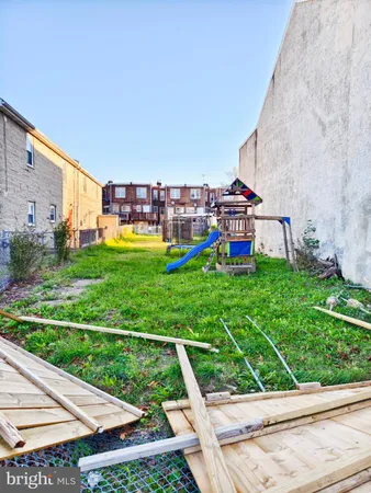 a view of a garden with a slide