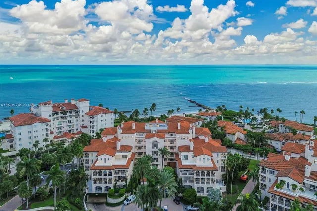 a view of a lake with a city