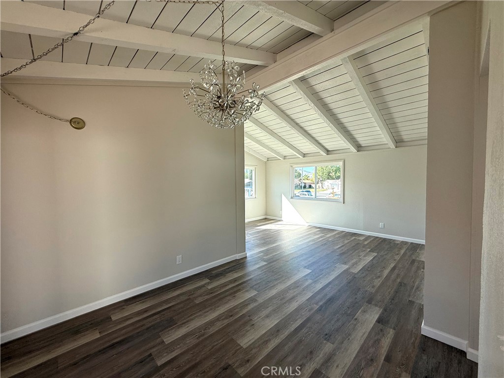 3445 Sparrow Circle Riverside, CA 92503 - Photo 12 of 41 en empty room with wooden floor and windows