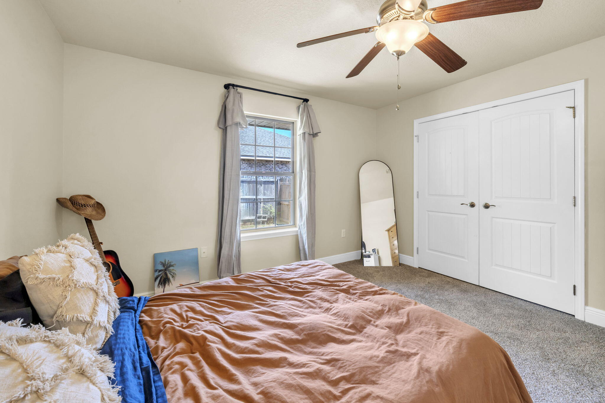 217 Raptor Drive Crestview, FL 32536 - Photo 39 of 48 a bedroom with a bed and a window