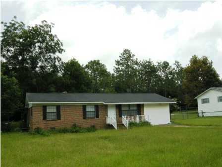 691 Ridge Lake Road Crestview, FL 32536 - Photo 2 of 15 a front view of a house with a garden