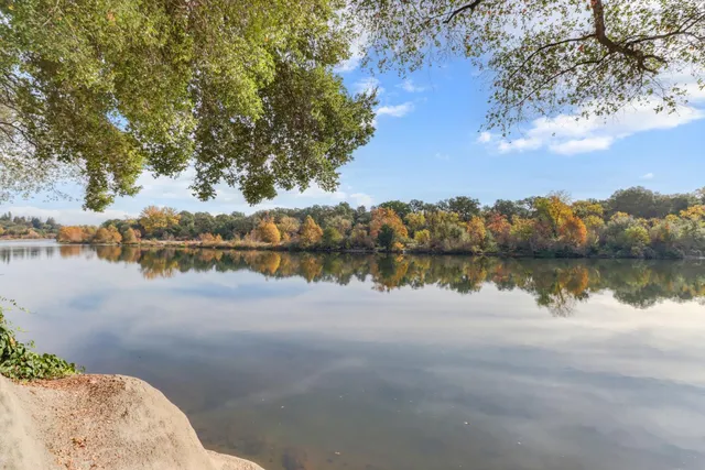 a view of a two chairs in the patio