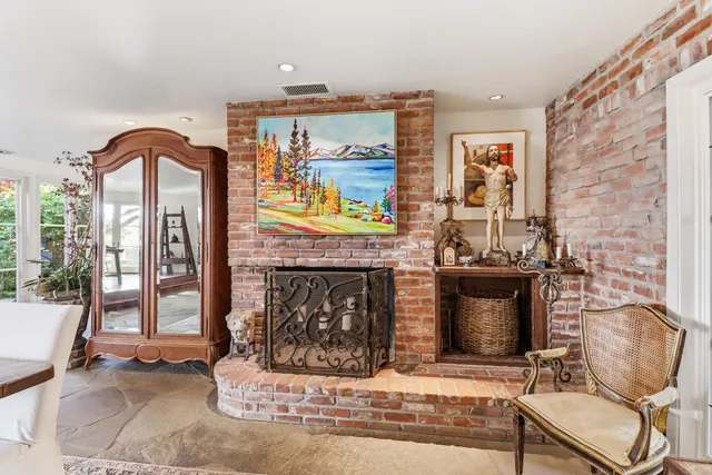 a kitchen with cabinets stainless steel appliances and a counter top space
