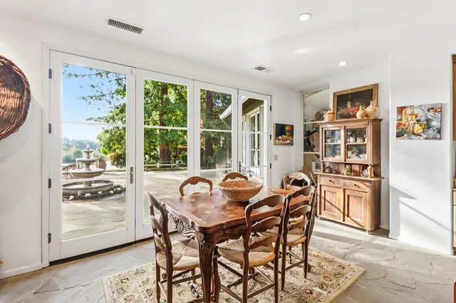 a bed room with a bed and a television