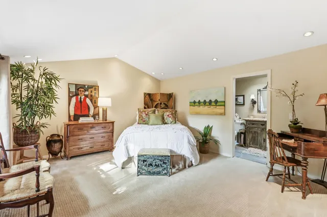 a view of a parked cars in front of a house
