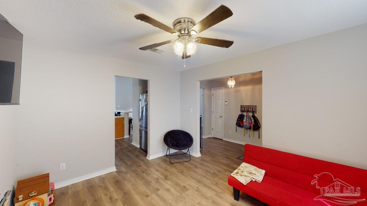 616 Reservation Avenue Pensacola, FL 32507 - Photo 14 of 29 a view of workspace with a ceiling fan