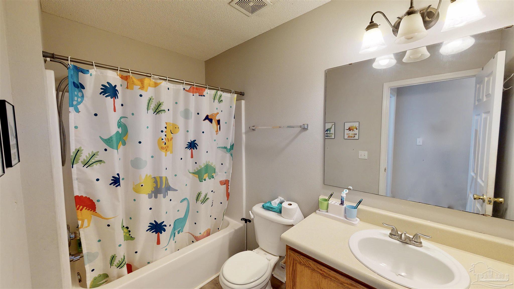 616 Reservation Avenue Pensacola, FL 32507 - Photo 25 of 29 a bathroom with a sink toilet and shower
