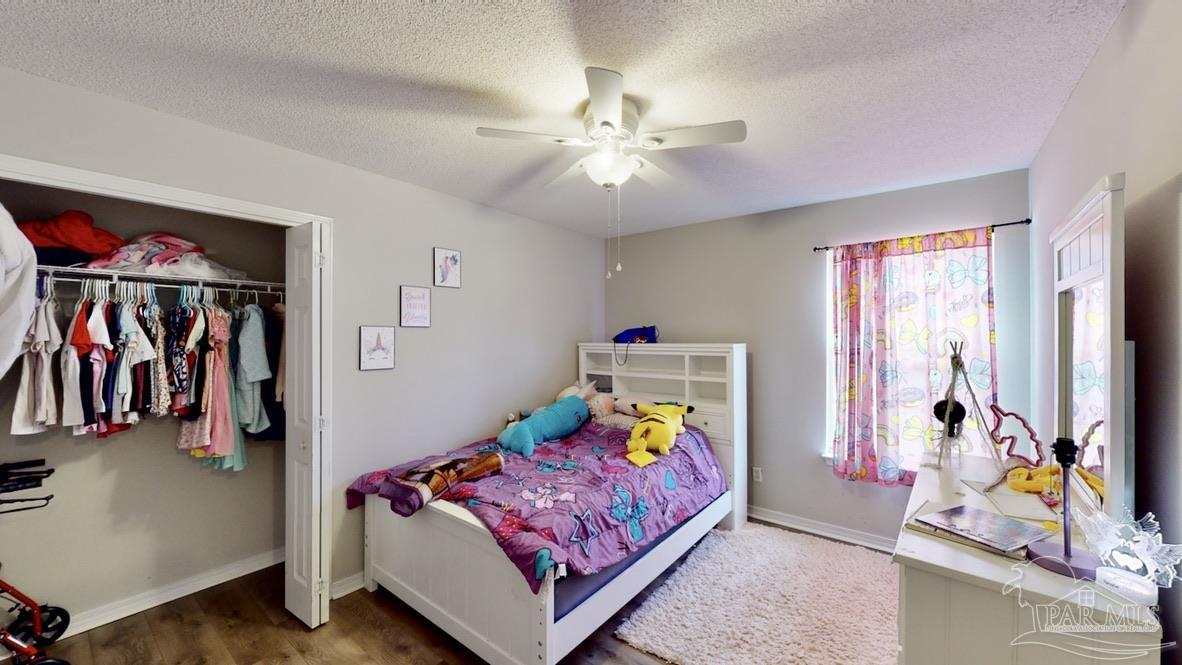 616 Reservation Avenue Pensacola, FL 32507 - Photo 26 of 29 a living room with furniture and a window