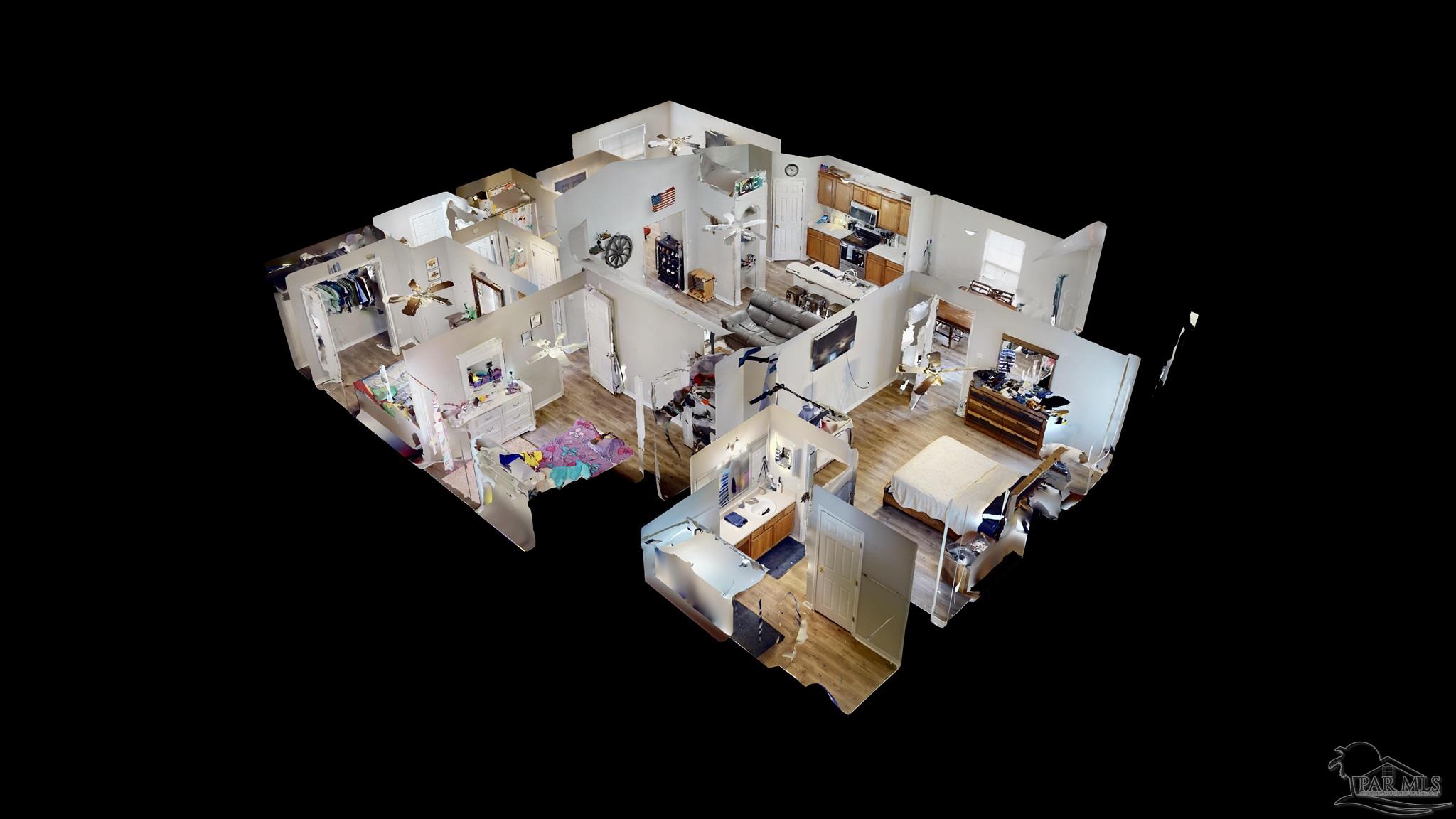 616 Reservation Avenue Pensacola, FL 32507 - Photo 3 of 29 a bed sitting in a bedroom next to a lamp