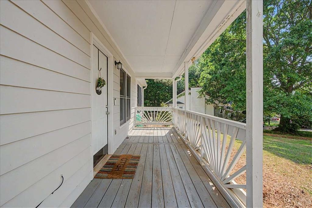 94 Villa Rosa Way Temple, GA 30179 - Photo 6 of 34 a view of balcony with wooden floor