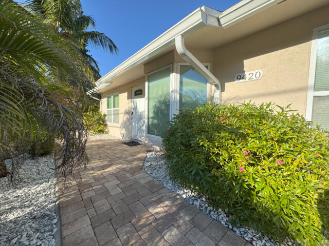 9420 Nickels Boulevard Boynton Beach, FL 33436 - Photo 1 of 57 a view of a house with a yard