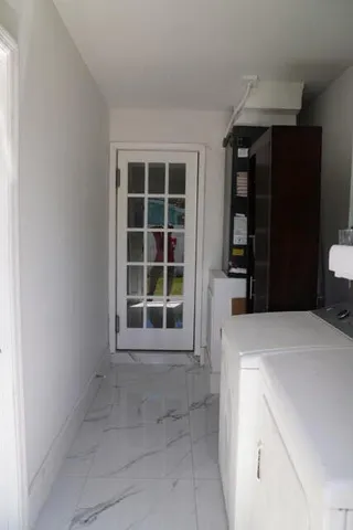 a view of dining room and chandelier