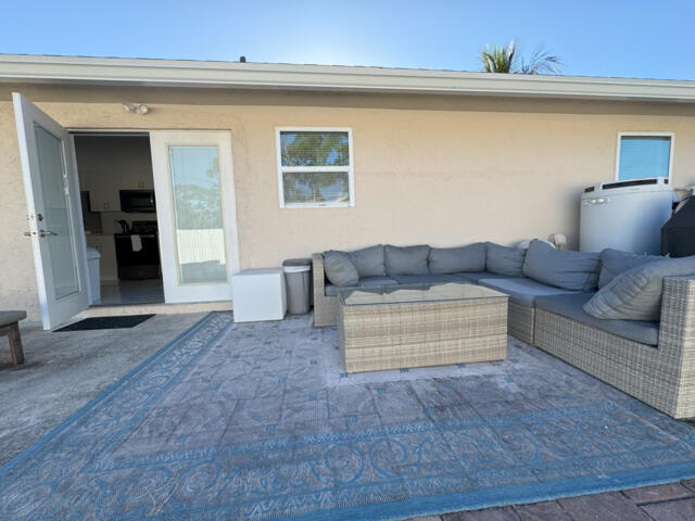9420 Nickels Boulevard Boynton Beach, FL 33436 - Photo 29 of 57 a living room with furniture and a rug