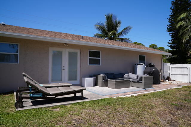9420 Nickels Boulevard Boynton Beach, FL 33436 - Photo 31 of 57 a view of a backyard with a patio