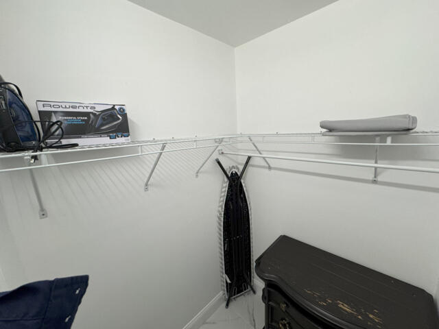 9420 Nickels Boulevard Boynton Beach, FL 33436 - Photo 33 of 57 a room with storage and utility