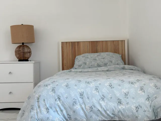 a bathroom with a toilet sink and shower