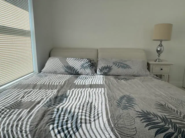 a bathroom with a toilet a sink and a mirror