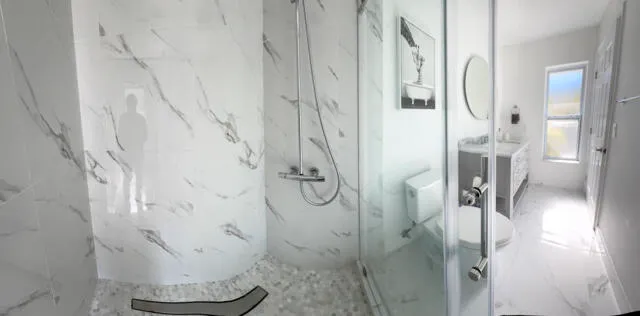 a bedroom with bed and window