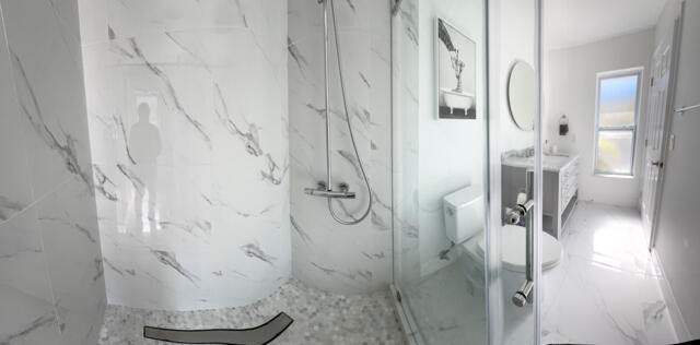 9420 Nickels Boulevard Boynton Beach, FL 33436 - Photo 49 of 57 a bathroom with a granite countertop shower and a mirror