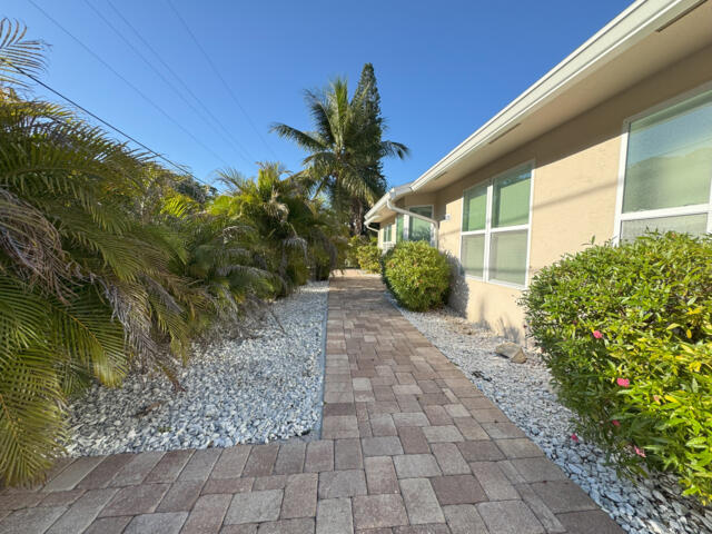 9420 Nickels Boulevard Boynton Beach, FL 33436 - Photo 6 of 57 a house with a yard