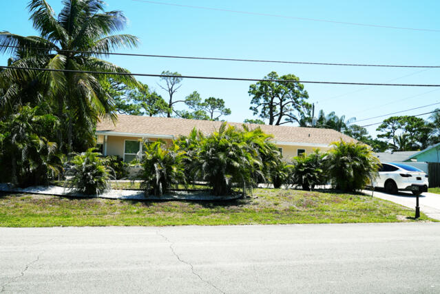 9420 Nickels Boulevard Boynton Beach, FL 33436 - Photo 8 of 57 a view of a house with a yard