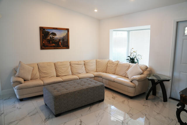 9420 Nickels Boulevard Boynton Beach, FL 33436 - Photo 10 of 57 a living room with furniture and a window