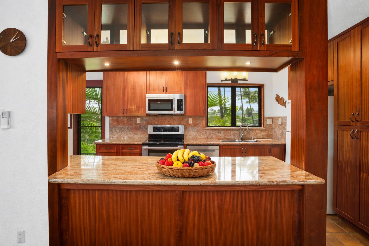 1870 Hoone Road, Unit 511 Koloa, HI 96756 - Photo 12 of 26 a kitchen with a sink and a microwave