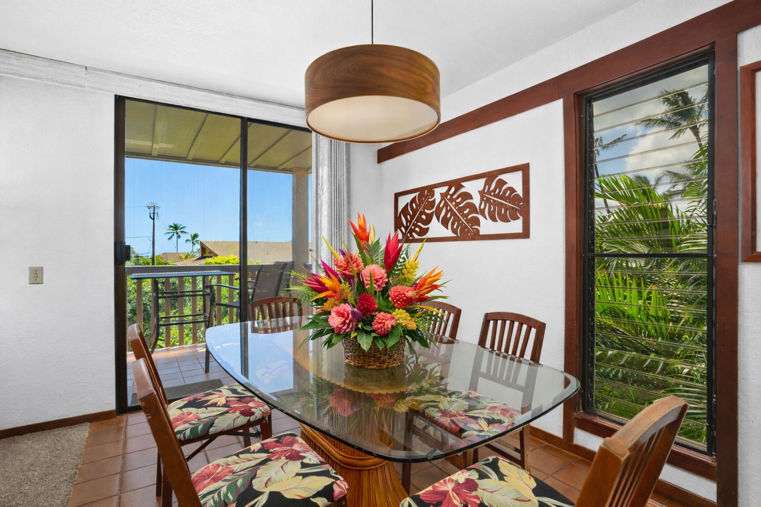 1870 Hoone Road, Unit 511 Koloa, HI 96756 - Photo 6 of 26 a dining room with furniture and wooden floor