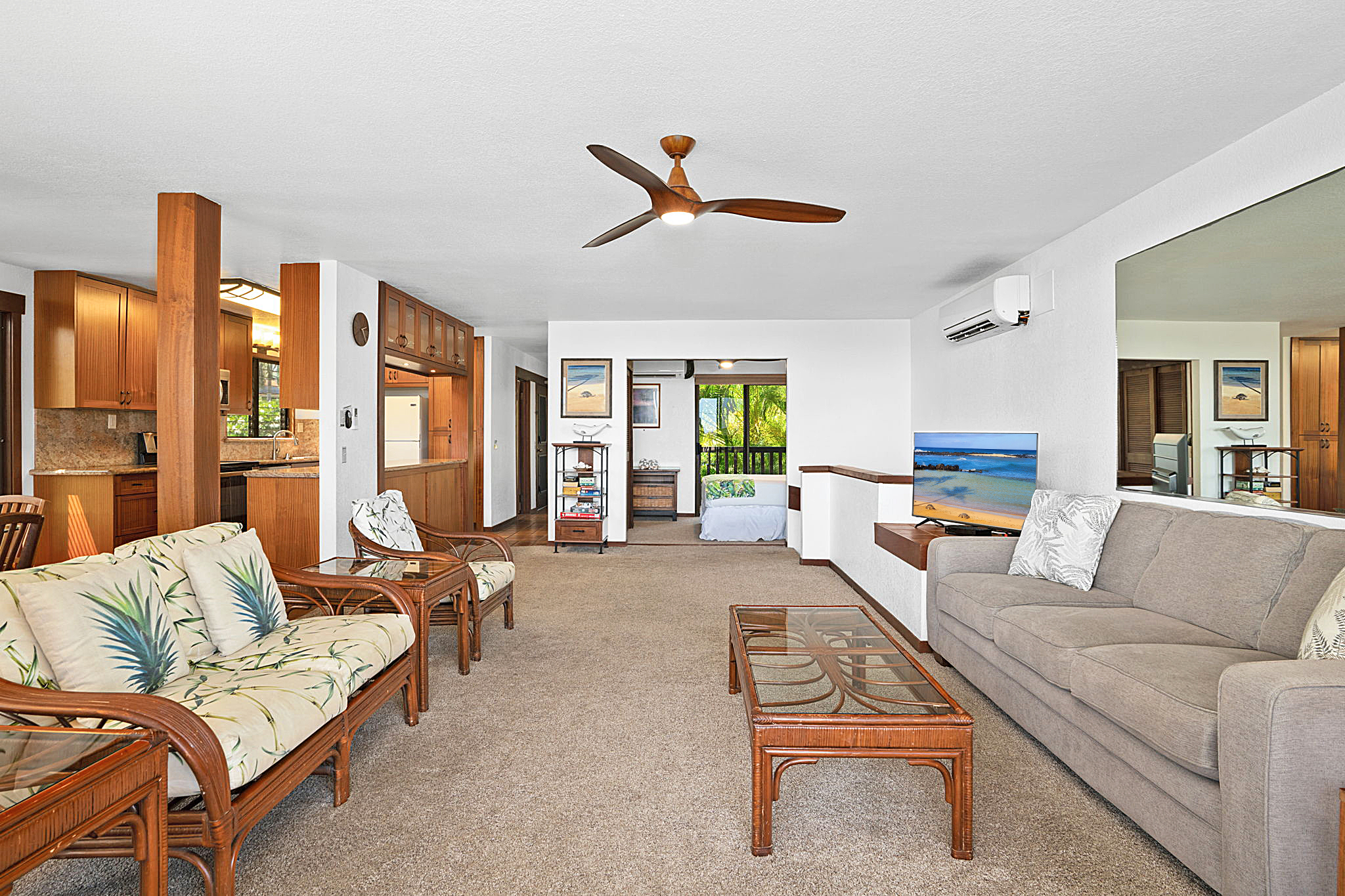 1870 Hoone Road, Unit 511 Koloa, HI 96756 - Photo 8 of 26 a living room with furniture and a large window