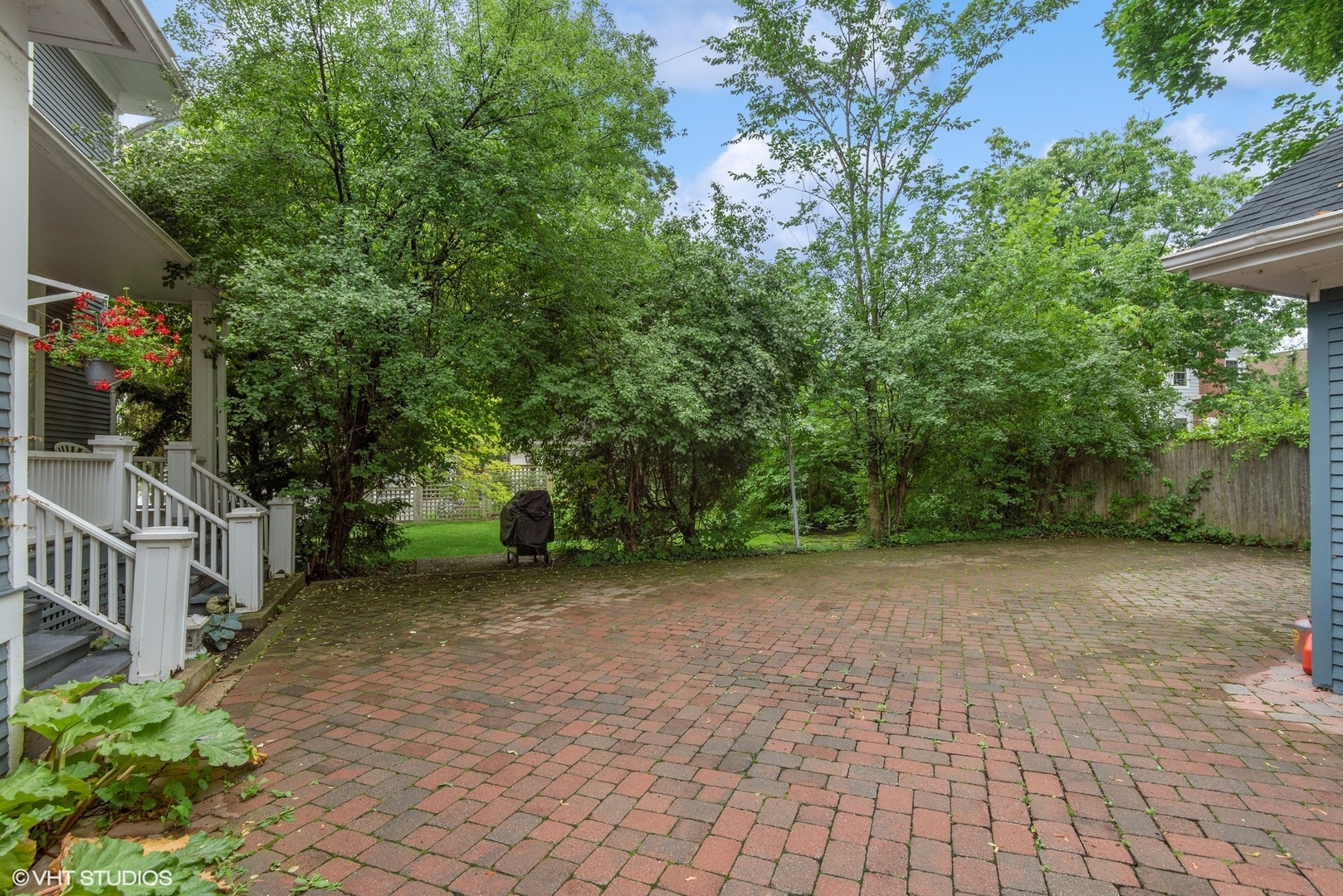 664 Lincoln Avenue Winnetka, IL 60093 - Photo 21 of 26 a view of a yard with plants and trees