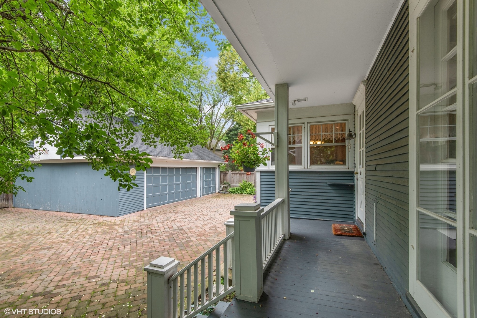 664 Lincoln Avenue Winnetka, IL 60093 - Photo 23 of 26 a view of house with backyard and a garden