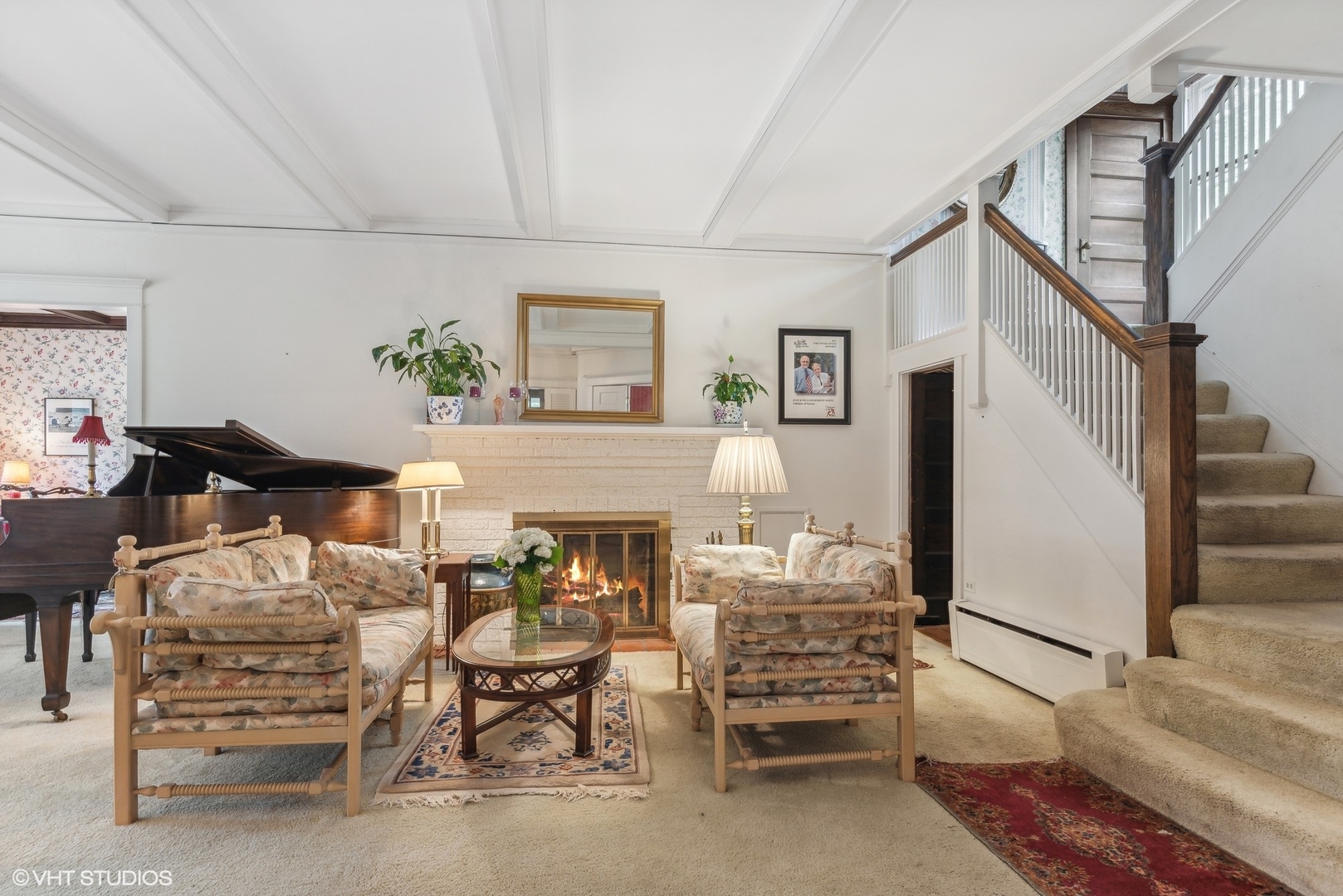 664 Lincoln Avenue Winnetka, IL 60093 - Photo 5 of 26 a view of a livingroom with furniture and a fireplace