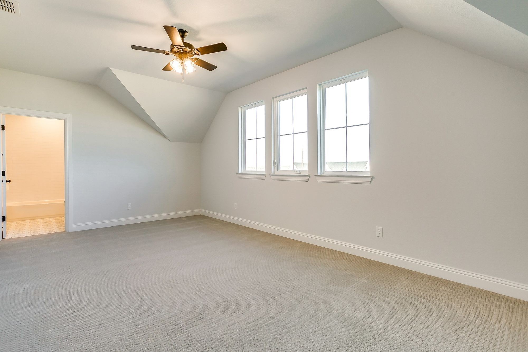 1526 Columbia Road Charlotte, TN 37036 - Photo 10 of 17 an empty room with a window and a ceiling fan
