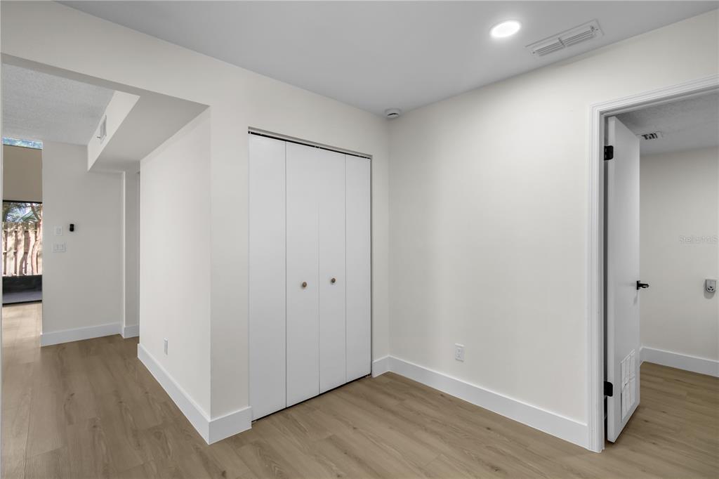 1888 Springbush Lane Clearwater, FL 33763 - Photo 11 of 31 a view of an empty room with wooden floor