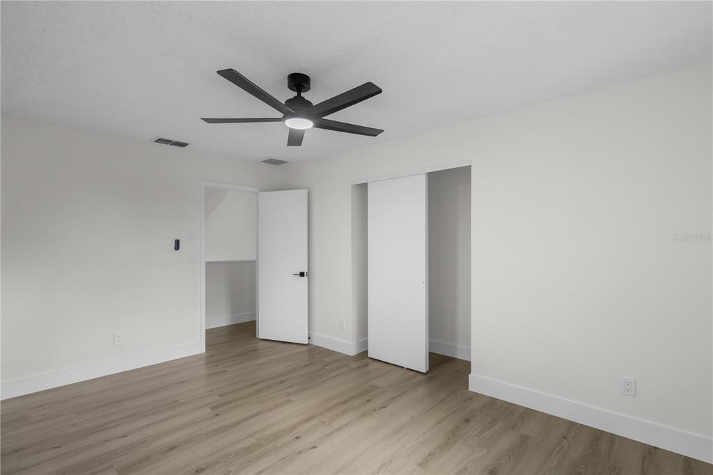 1888 Springbush Lane Clearwater, FL 33763 - Photo 20 of 31 a view of an empty room with wooden floor