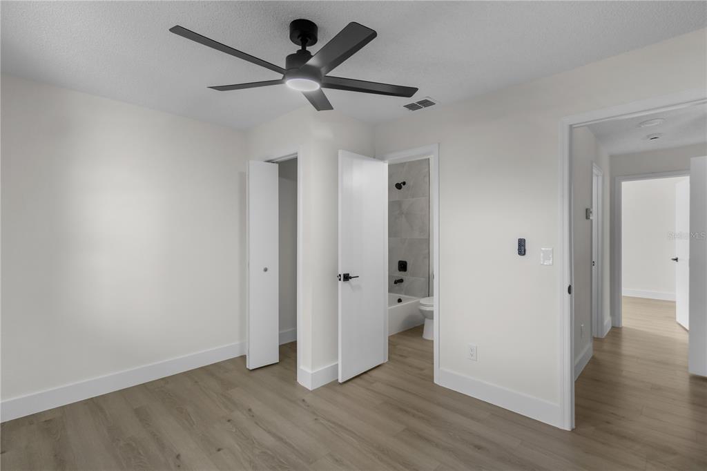 1888 Springbush Lane Clearwater, FL 33763 - Photo 21 of 31 a view of a hallway with wooden floor