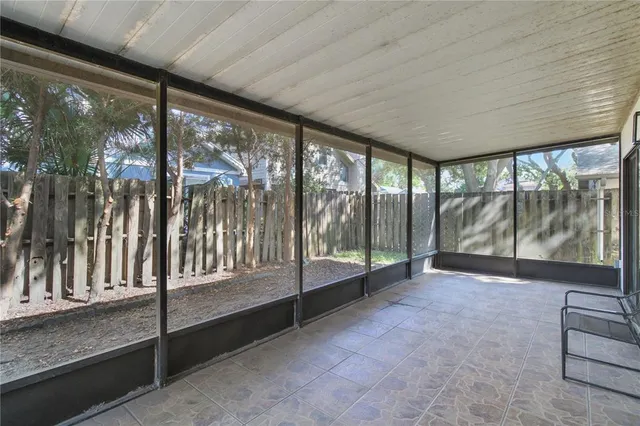 a view of an empty room with a balcony