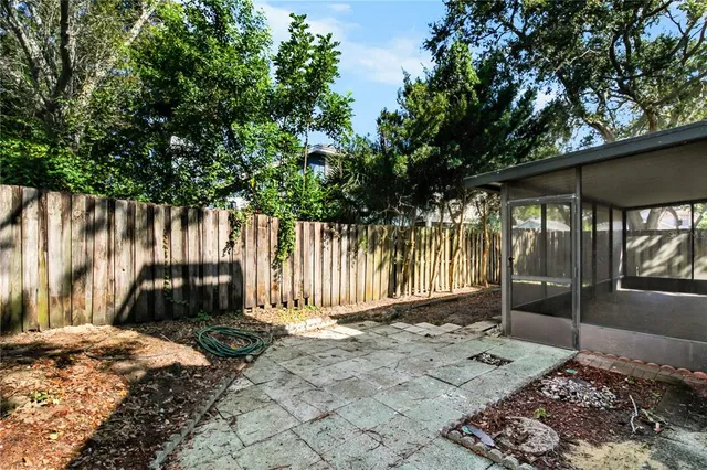 a view of a back yard from a hallway