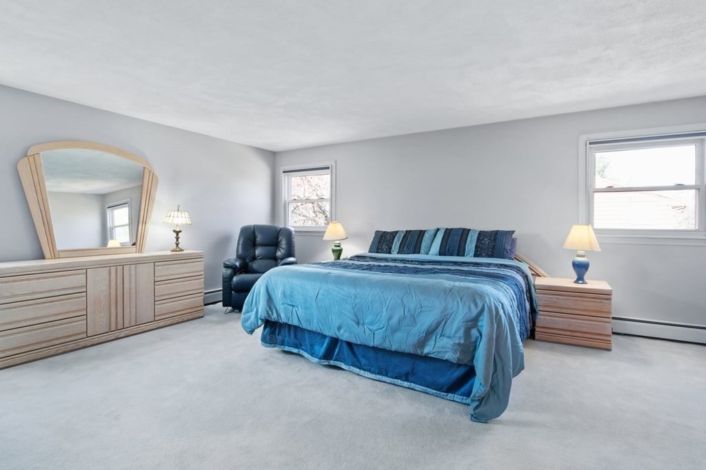 6 Dudley Road Lexington, MA 02421 - Photo 16 of 37 a bedroom with bed and window